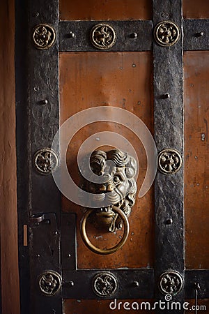 Wrought iron lion door handle. Stock Photo