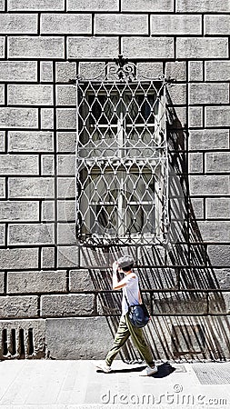 Wrought iron street window in Florence, Italy Editorial Stock Photo