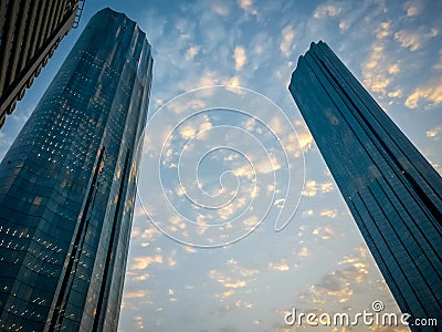 WTC World Trade Center and Sheikh Mohammed Bin Rashid Tower cloudy sunset in Abu Dhabi Editorial Stock Photo