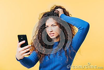 Wtf mistake angry woman hair smartphone emotion Stock Photo