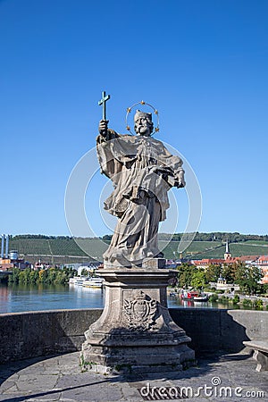 Wurzburg's Old Main Bridge, Germany - Alte Mainbrucke with many nice statues of saints - Nepomuk - Editorial Stock Photo