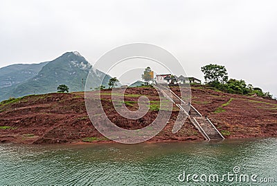 Ferry passengers sitting on steps along Dicui gorge, Wushan, China Editorial Stock Photo