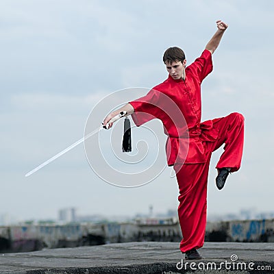 Wushoo man in red practice martial art Stock Photo