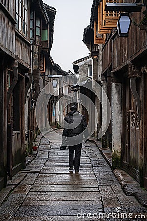 Local walking in the old streets of Wuzhen Editorial Stock Photo