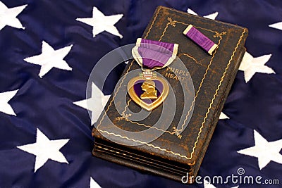 WWII Purple Heart on American Flag Stock Photo