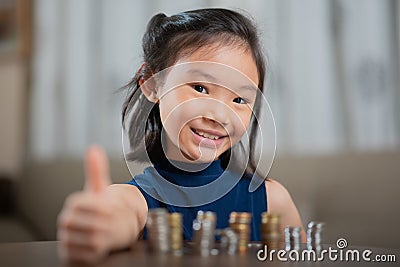 Asian girl, managing finances, counting money Stock Photo