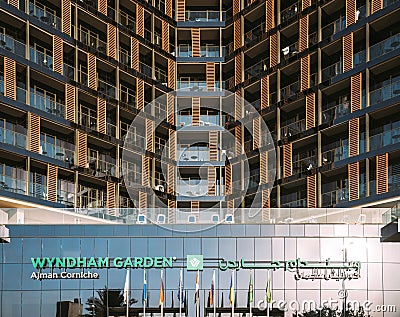 Wyndham Garden Ajman Corniche Hotel Sign. Building Of Wyndham Garden Corniche hotel In Sunny Day Editorial Stock Photo