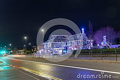 'Daft As a Brush' cancer patient transport charity's building lit up in Newcastle upon Tyne, UK Editorial Stock Photo