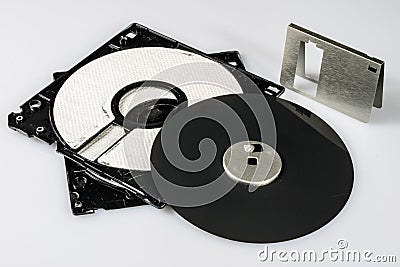 3.5 "diskette. Broken data carrier to old computers on an isolat Stock Photo