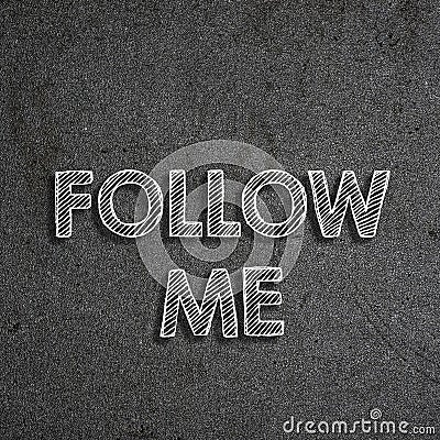 Text & x22;Follow me& x22; written on a chalkboard Stock Photo