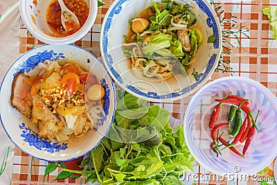 ( Mi Quang) noodle with meat, vegetable, fish, chicken and spices Stock Photo