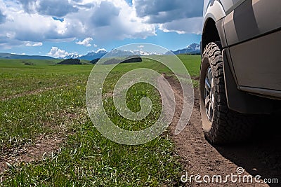 4x4 offroad van on mountain valley. Off-road travel, journey in motorhome concept Stock Photo