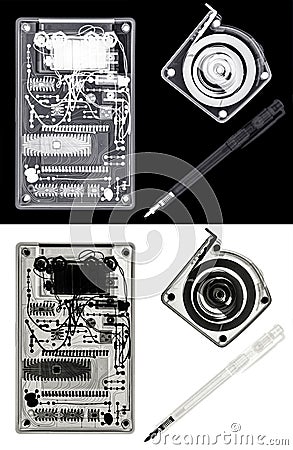 X-ray of a Calculator, a Self-retracting metal tape measure and a Ballpoint pen Stock Photo