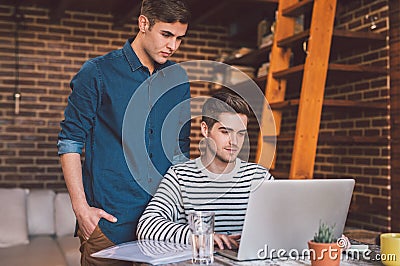 They're a tech savvy young couple Stock Photo