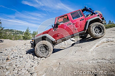 4x4 truck descending steep rock. Editorial Stock Photo