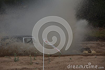 4x4 vehicle driving through Limpopo riverbed. Stock Photo