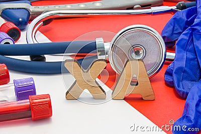 XA medical abbreviation meaning LMW heparin in blood in laboratory diagnostics on red background. Chemical name of XA is surrounde Stock Photo