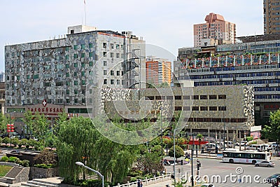 View of the street and interesting buildings of the modern part of the city from the city wall of XI`an Editorial Stock Photo