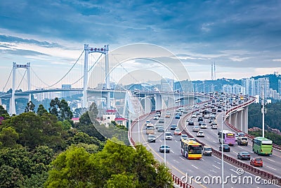 Xiamen haicang bridge at dusk with busy traffic Stock Photo