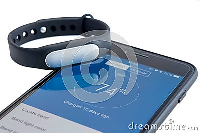 Xiaomi Mi Band on iPhone 6 Plus Editorial Stock Photo