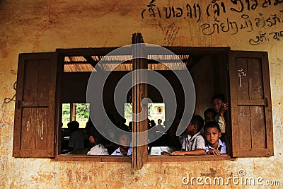 XIENG KHOUANG, LAOS - SEP 09 : Unidentified kids post on camera at school Editorial Stock Photo