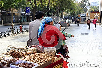 Xinjiang people selling dried fruit Editorial Stock Photo