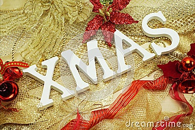 XMAS letters with red ribbon and Christmas decoration Stock Photo