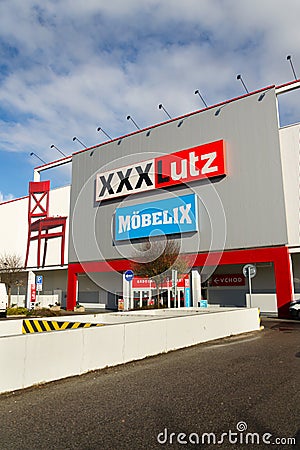 XXXLutz Mobelix corporation logo on supermarket building Editorial Stock Photo