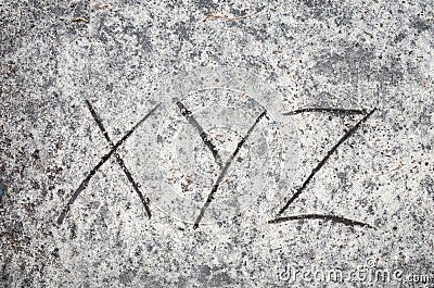 Xyz letters on sand background Stock Photo