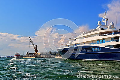 Yacht Carinthia VII and boat in Venice, Italy Editorial Stock Photo