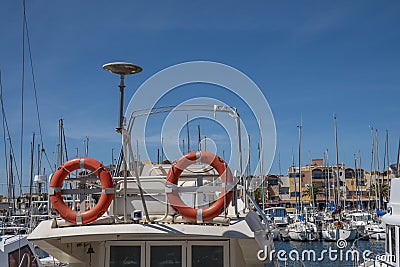 Yacht with lifebuoys Stock Photo
