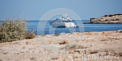Yacht near coast at Ibiza Stock Photo