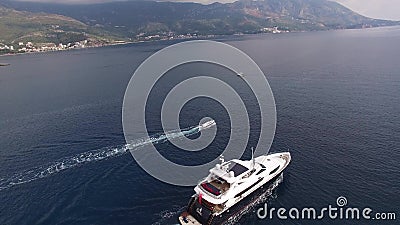 Yacht in the sea, aerial photography drone, Budva, near Dukley G. Ardens, Adriatic Sea, Montenegro, Balkans stock footage Yacht in the sea, aerial photography drone, Budva, near Dukley G. Ardens, Adriatic Sea, Montenegro, Balkans stock footage