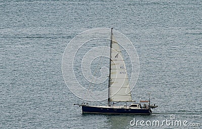 Yacht travelling off the waters of Auckland, New Zealand waterfront Editorial Stock Photo