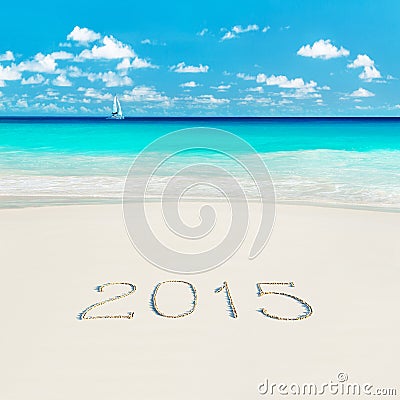 Yacht at tropical beach and 2015 happy new year sandy caption. S Stock Photo