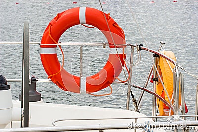 Yachting, orange lifebuoy on sailboat Stock Photo