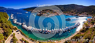 Yachts anchored in harbour in Fiskardo Kefalonya bay in Greece Stock Photo