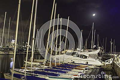 Yachts and boats parked in marina at night,Israel Editorial Stock Photo