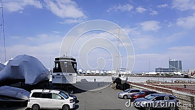 Yachts and cars. Vladivostok. Primorsky Krai. Russia. 2019. Editorial Stock Photo