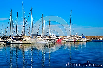 Yachts docked in sea port Editorial Stock Photo