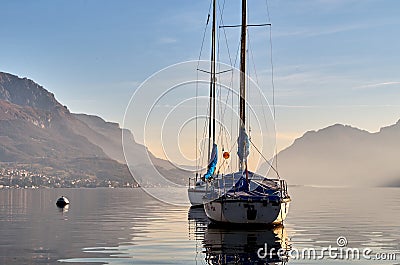 Yachts on a lake Como, Italy. Aerial panoramic view to the luxury yacht - famous old Italy town on bank of Como lake. Landscape Editorial Stock Photo