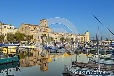 Yachts reflecting in blue water in the old town port of La Ciotat, Marseilles district, France, in the evening light Stock Photo