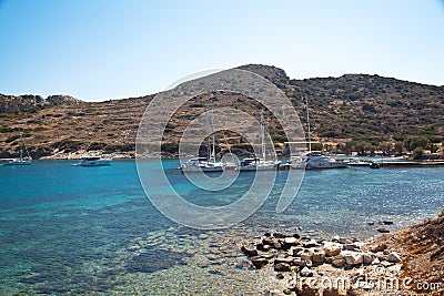 Yachts and ships waiting at the ancient city port of Knidos are on vacation.Turkey Mugla Datca, June 28 2023 Editorial Stock Photo