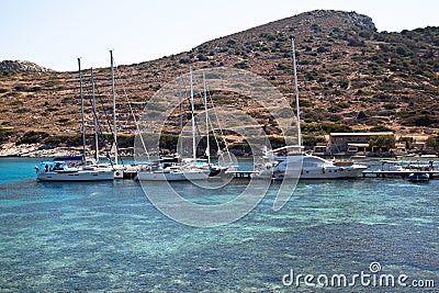 Yachts and ships waiting at the ancient city port of Knidos are on vacation.Turkey Mugla Datca, June 28 2023 Editorial Stock Photo