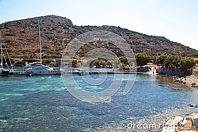 Yachts and ships waiting at the ancient city port of Knidos are on vacation.Turkey Mugla Datca, June 28 2023 Editorial Stock Photo