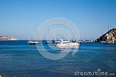 Yachts and ships waiting at the ancient city port of Knidos are on vacation.Turkey Mugla Datca, June 28 2023 Editorial Stock Photo