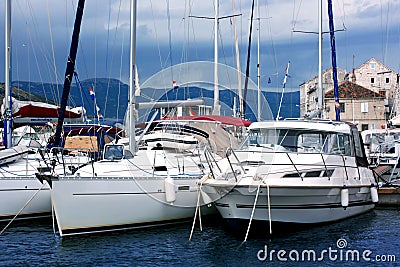 Yachts line up in Croatia seaside port Stock Photo