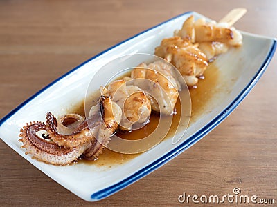 Yakitori: japanese squid skewers in sauce Stock Photo