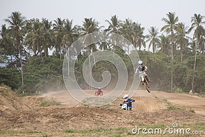 Yala, Thailand - APRIL 20, 2014: Motorcross riders jump in Yala Editorial Stock Photo