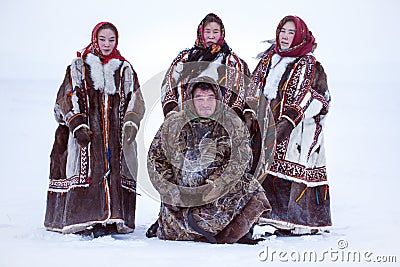 Yamalo-Nenets Autonomous Okrug, extreme north, Nenets family in the national winter clothes of the northern inhabitants of the Stock Photo